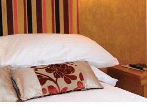 The Bedrooms at Ennios Boutique Hotel