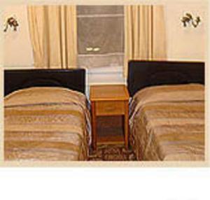 The Bedrooms at Caswell Hotel