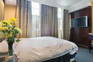 The Bedrooms at Grand Royale London Hyde Park
