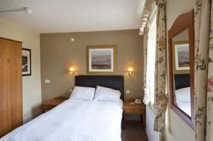 The Bedrooms at The Woolpack Inn