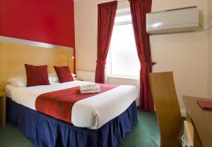 The Bedrooms at Comfort Inn And Suites Kings Cross St. Pancras