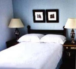 The Bedrooms at Dukes Of Windsor Street Hotel