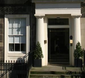 The Bedrooms at Dukes Of Windsor Street Hotel