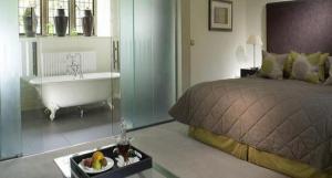 The Bedrooms at Lower Slaughter Manor - A Relais and Chateaux Hotel