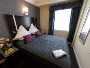 The Bedrooms at Best Western Shaftesbury Paddington Court Suites