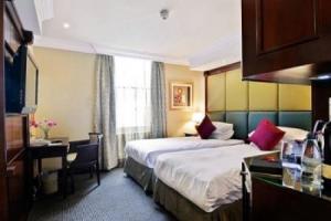 The Bedrooms at Grand Royale London Hyde Park