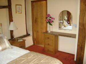 The Bedrooms at Twitham Barn