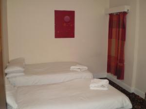 The Bedrooms at Paramount Hotel And Balti Restaurant