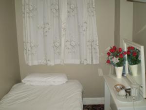The Bedrooms at Paramount Hotel And Balti Restaurant