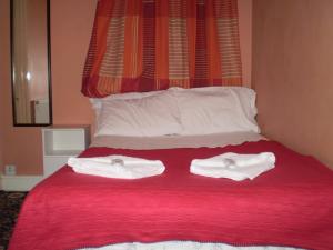 The Bedrooms at Paramount Hotel And Balti Restaurant