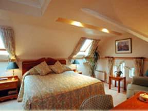 The Bedrooms at Duxford Lodge Hotel