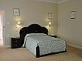 The Bedrooms at The Hadlow Manor Hotel
