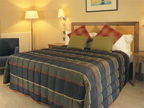 The Bedrooms at The Cambridge Belfry - QHotels
