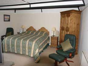 The Bedrooms at Coach House Cottage