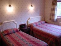 The Bedrooms at Huntingdon House Hotel