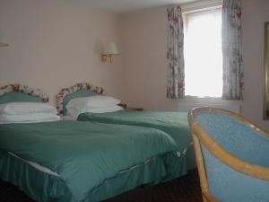 The Bedrooms at Wayford Bridge Inn Hotel