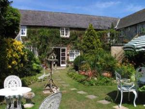 The Bedrooms at The Woodstock House Hotel - Guest House