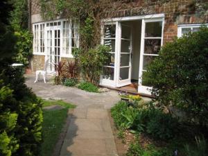 The Bedrooms at The Woodstock House Hotel - Guest House