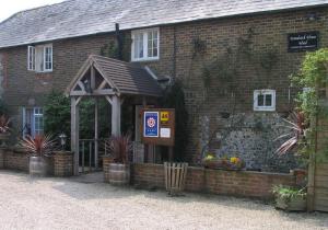 The Bedrooms at The Woodstock House Hotel - Guest House