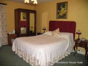 The Bedrooms at The Woodstock House Hotel - Guest House