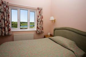 The Bedrooms at Wayford Bridge Inn Hotel