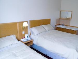 The Bedrooms at Junction 10 Budget Travel Accommodation