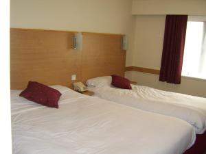 The Bedrooms at Days Inn Warwick
