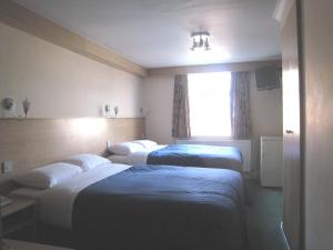 The Bedrooms at West Cromwell Hotel