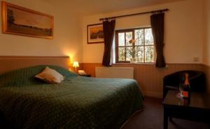 The Bedrooms at Blazing Donkey Country Hotel