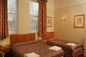 The Bedrooms at Channins Hounslow Hotel