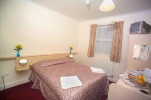The Bedrooms at Channins Hounslow Hotel