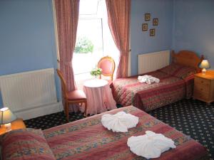The Bedrooms at Brampton Court Hotel