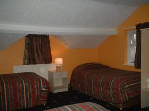 The Bedrooms at Russell Court Hotel