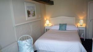 The Bedrooms at Orles Barn