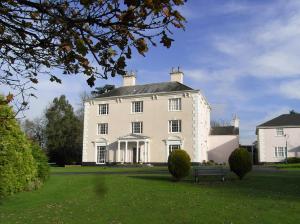 The Bedrooms at Rumwell Manor Hotel