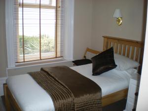 The Bedrooms at The Windsor Carlton - Guest Accommodation