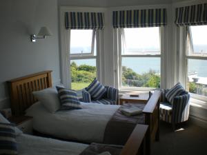 The Bedrooms at The Windsor Carlton - Guest Accommodation